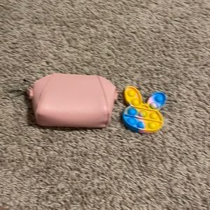 A pink penny bag with a GIF of a pop it